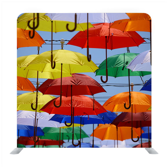 Multicolored Umbrellas On The City Street Backdrop - Backdropsource