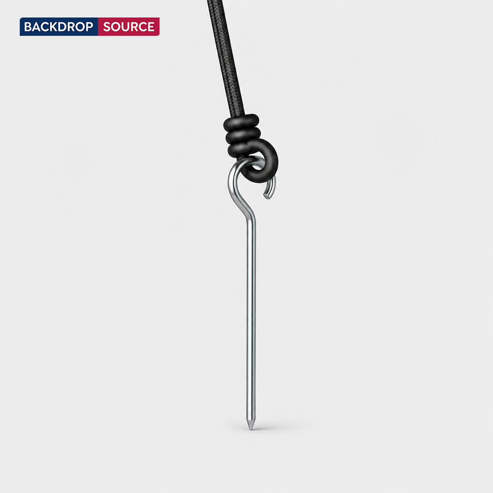 Rope and steel ground spike anchor kit for outdoor display stability