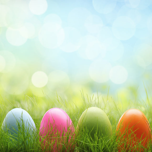 Row of Easter eggs in Fresh Green Grass - Backdropsource