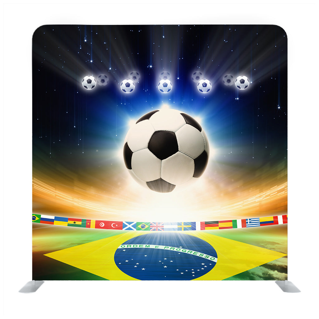 Abstract sports background - soccer ball, Brazil flag, bright light, stars in night sky