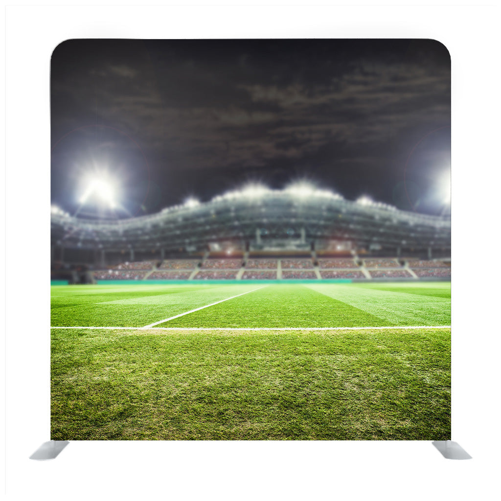 A Football Stadium with Fans in the Evening Background Media Wall - Backdropsource
