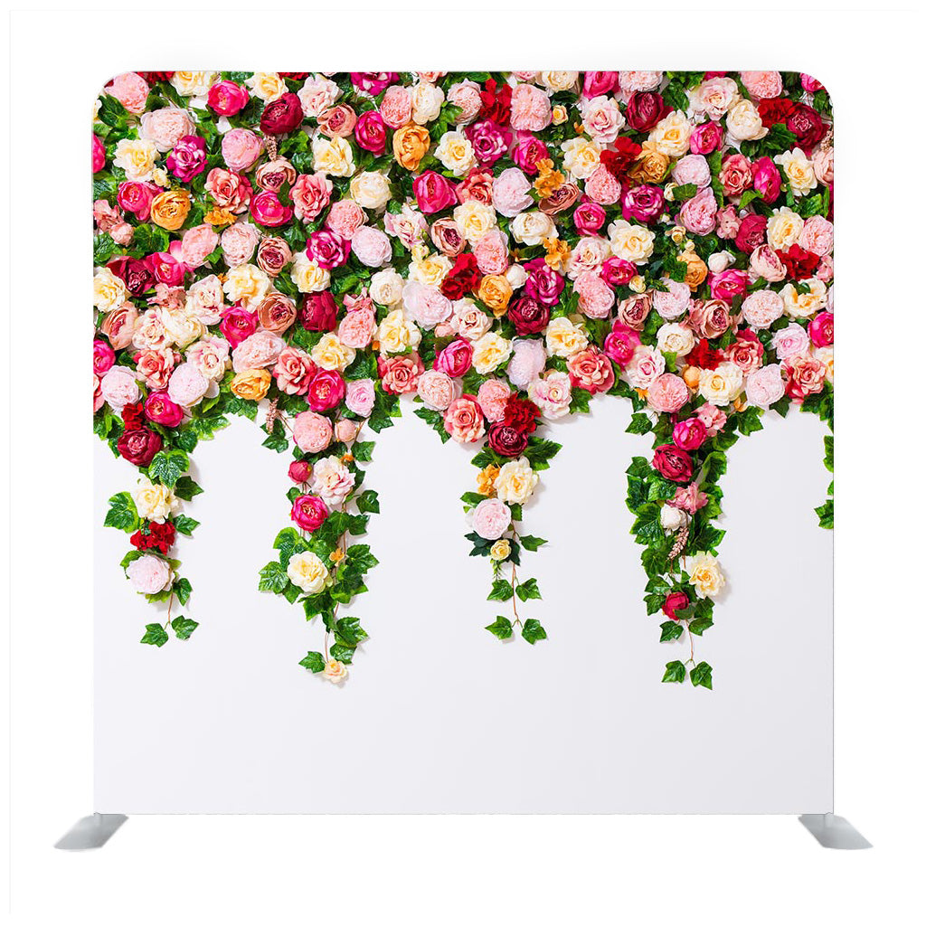 Close up of white wall with colorful flowers composition Backdrop - Backdropsource