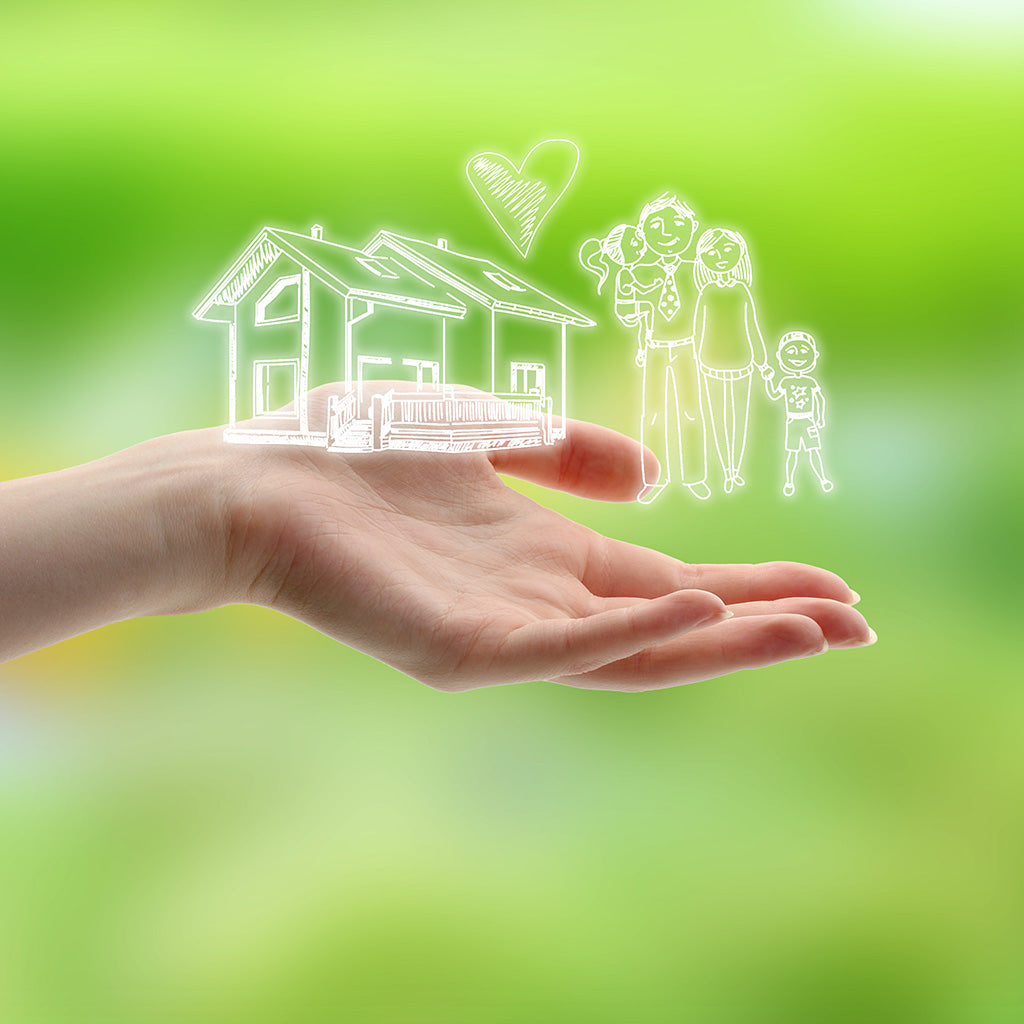 Female Hand with drawings of Family & House on Nature Background - Backdropsource