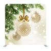Patterned Golden Bauble With Glitter Gold Bow Hanging On A Christmas Tree Media Wall