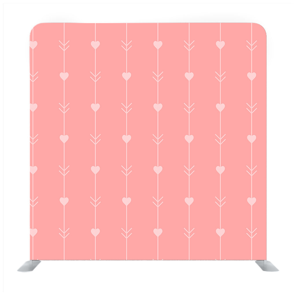 Pattern of hearts hand-drawn style polka dot red coral on a light pale coral Backdrop - Backdropsource