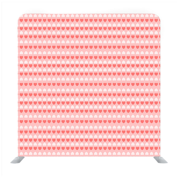 Pink background with baby pink and white heart pattern Media wall - Backdropsource