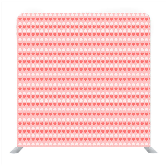 Pink background with baby pink and white heart pattern Media wall - Backdropsource