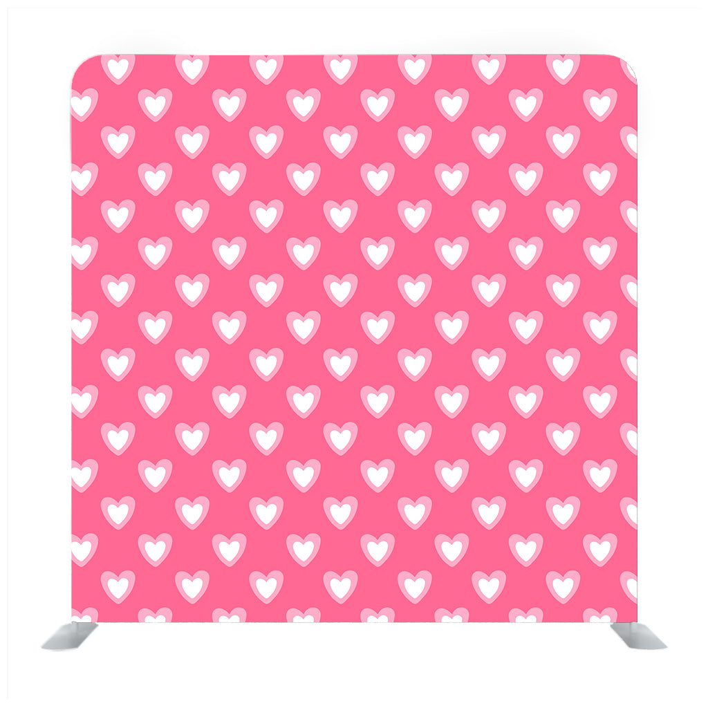 Pink background with white heart pattern media wall - Backdropsource