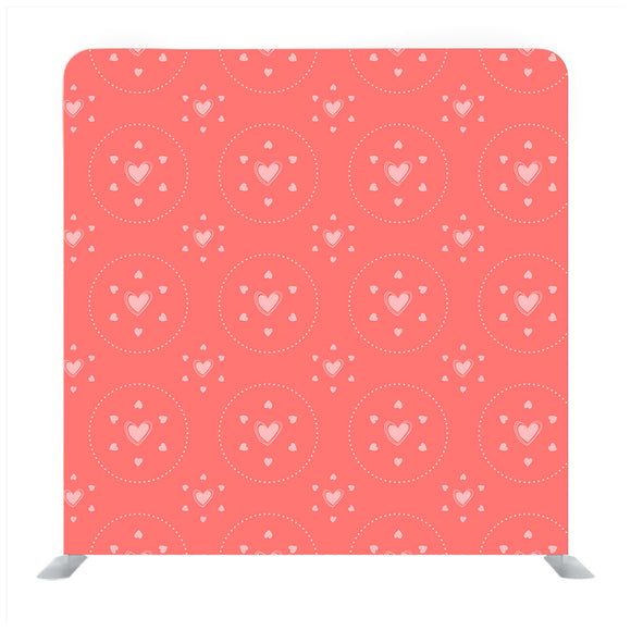White polka heart pattern on pastel orange Background Media wall - Backdropsource